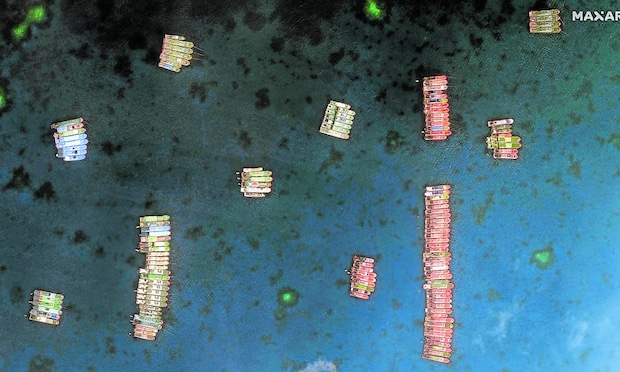 Aerial view of Chinese ships anchored 320 km west of Palawan. STORY: Chinese ‘swarming’ continues as 48 protests filed since June 30