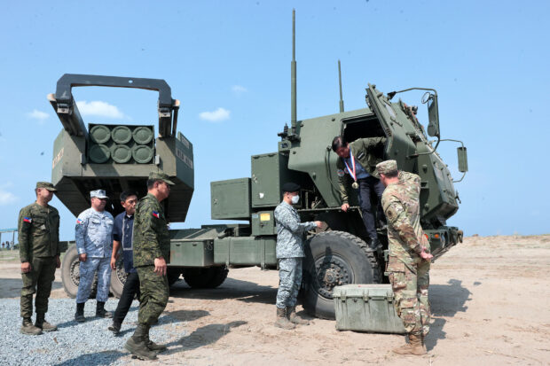 President Marcos, seen here alighting a truck equipped with US High-Mobility Artillery Rocket Systems, isthe first Philippine leader in 12 years to attend the annual “Balikatan” exercises between the United States and the Philippines, in San Antonio, Zambales, on Wednesday. 
