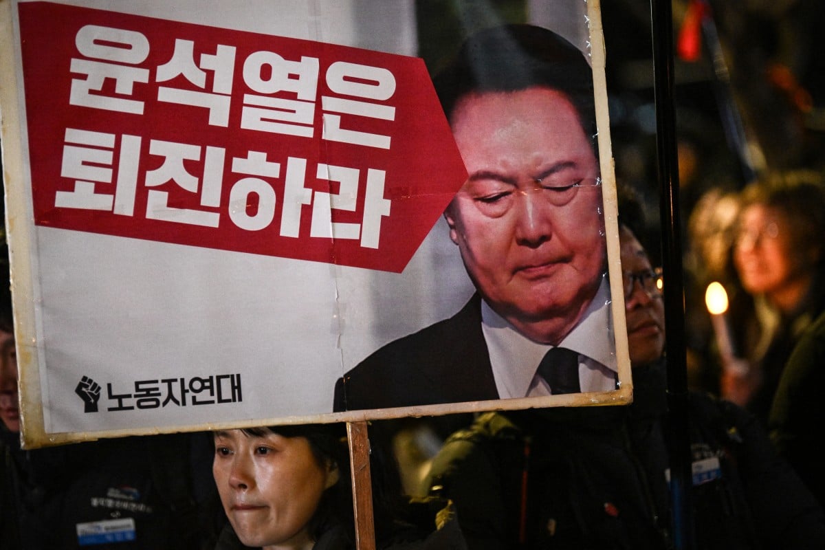 South Korea president clings to power after martial law U-turn