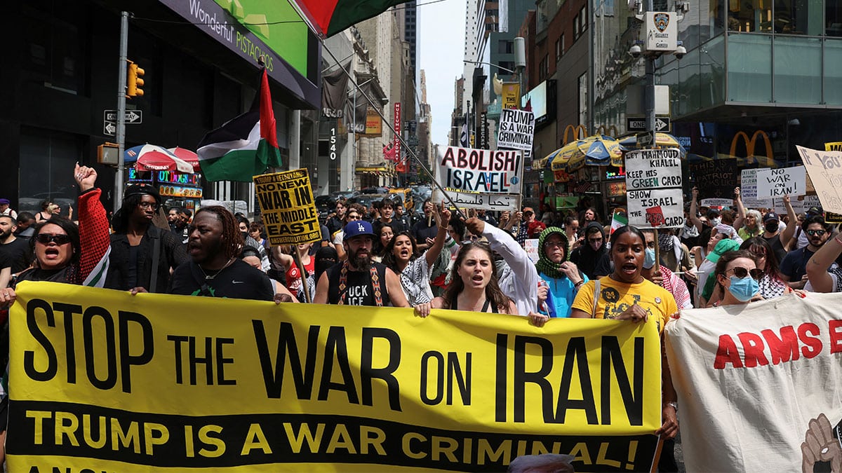 CALL FOR PEACE Demonstrators in NewYork City protest against the United States joining with Israel in attacks on Iranian nuclear facilities. —REUTERS