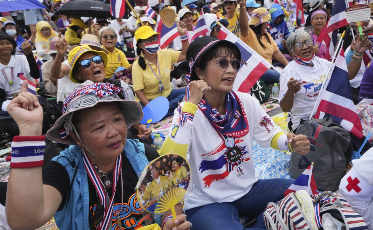 Protesters gather at Victory Monument demanding Thailand's Prime Minister Paetongtarn Shinawatra resign in Bangkok, Thailand, Saturday, June 28, 2025. (AP Photo/Sakchai Lalit)